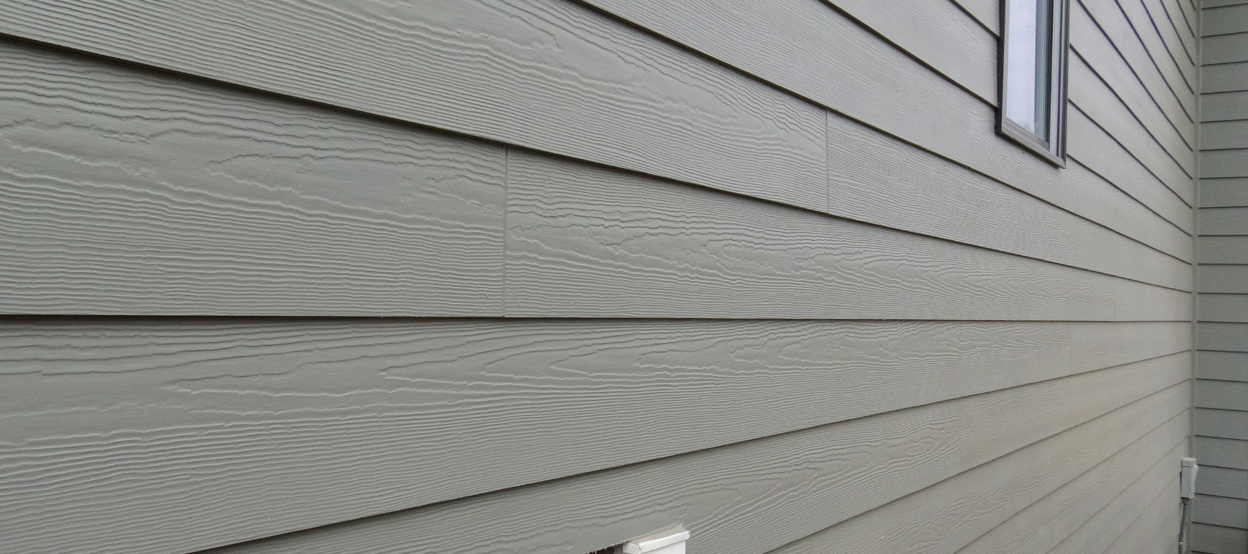 Beige vinyl siding.