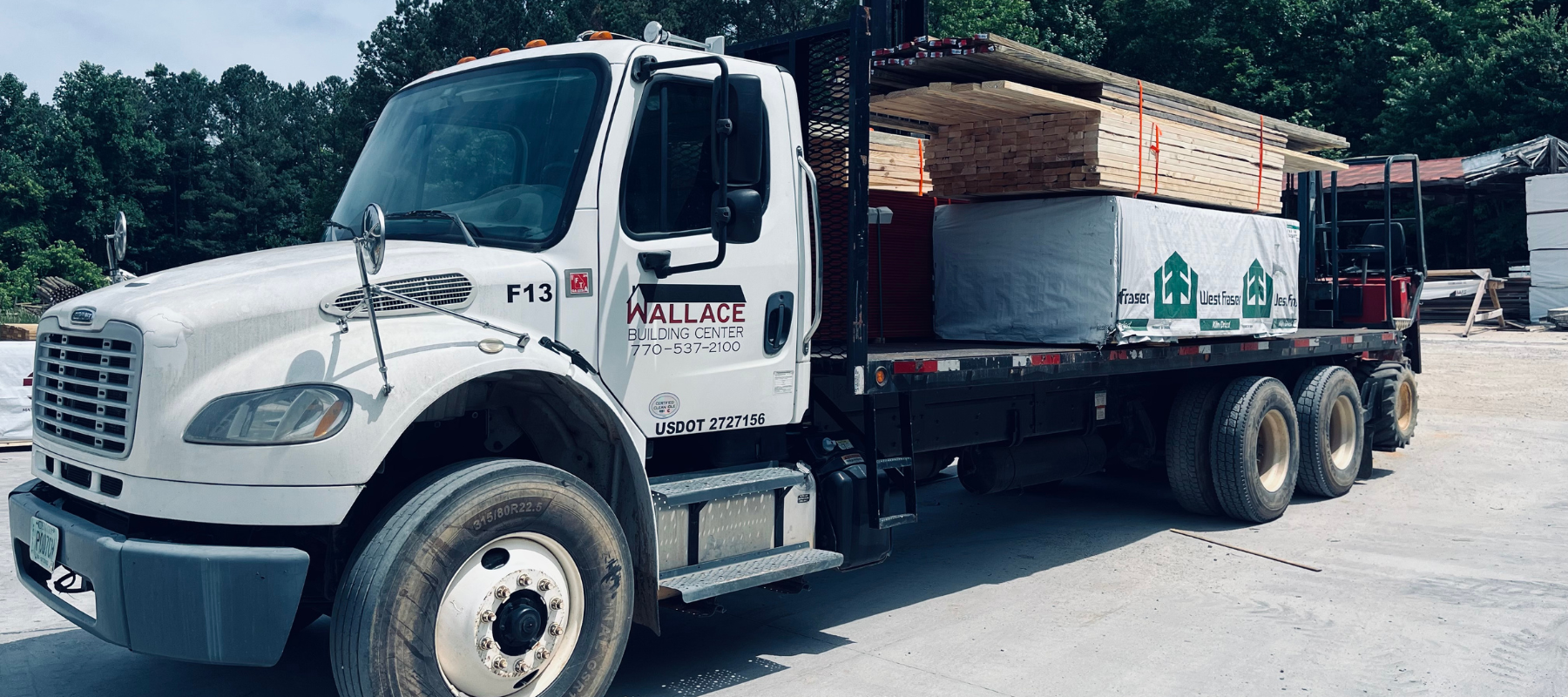 Wallace Building Center truck loaded with lumber, ready for delivery in Bremen, GA.