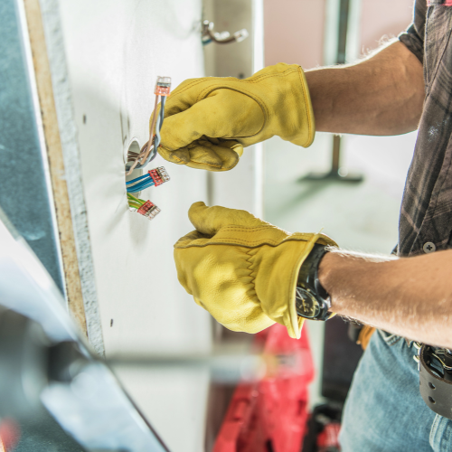 A power drill being used.