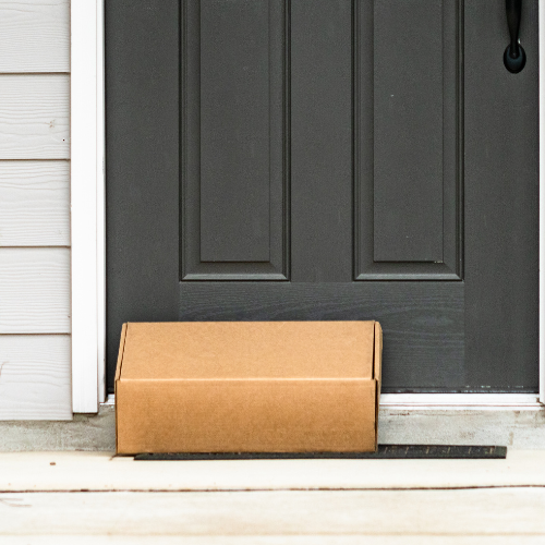 A delivered package at a doorstep