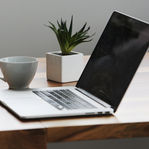 A close-up of a laptop on a desk