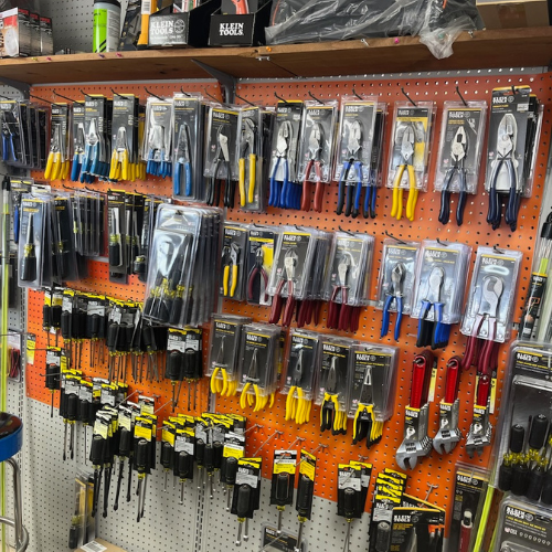 Various hand tools and supplies inside of S&S Wholesale warehouse