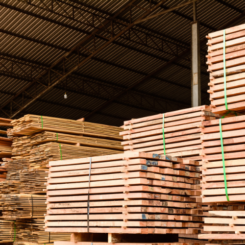 Stacked lumber and framing materials ready for pickup at Wallace Building Center.