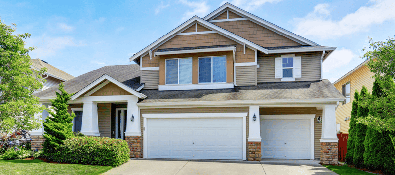 Brown vinyl siding samples and exterior cladding options on display.